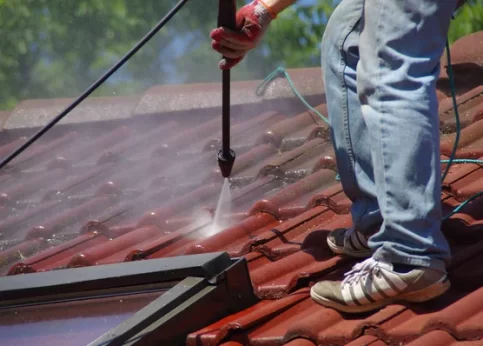 depositphotos_279101264-stock-photo-house-roof-cleaning-with-pressure